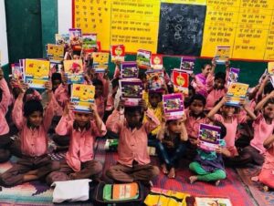 Distribution of books, new bags and stationary to village kids